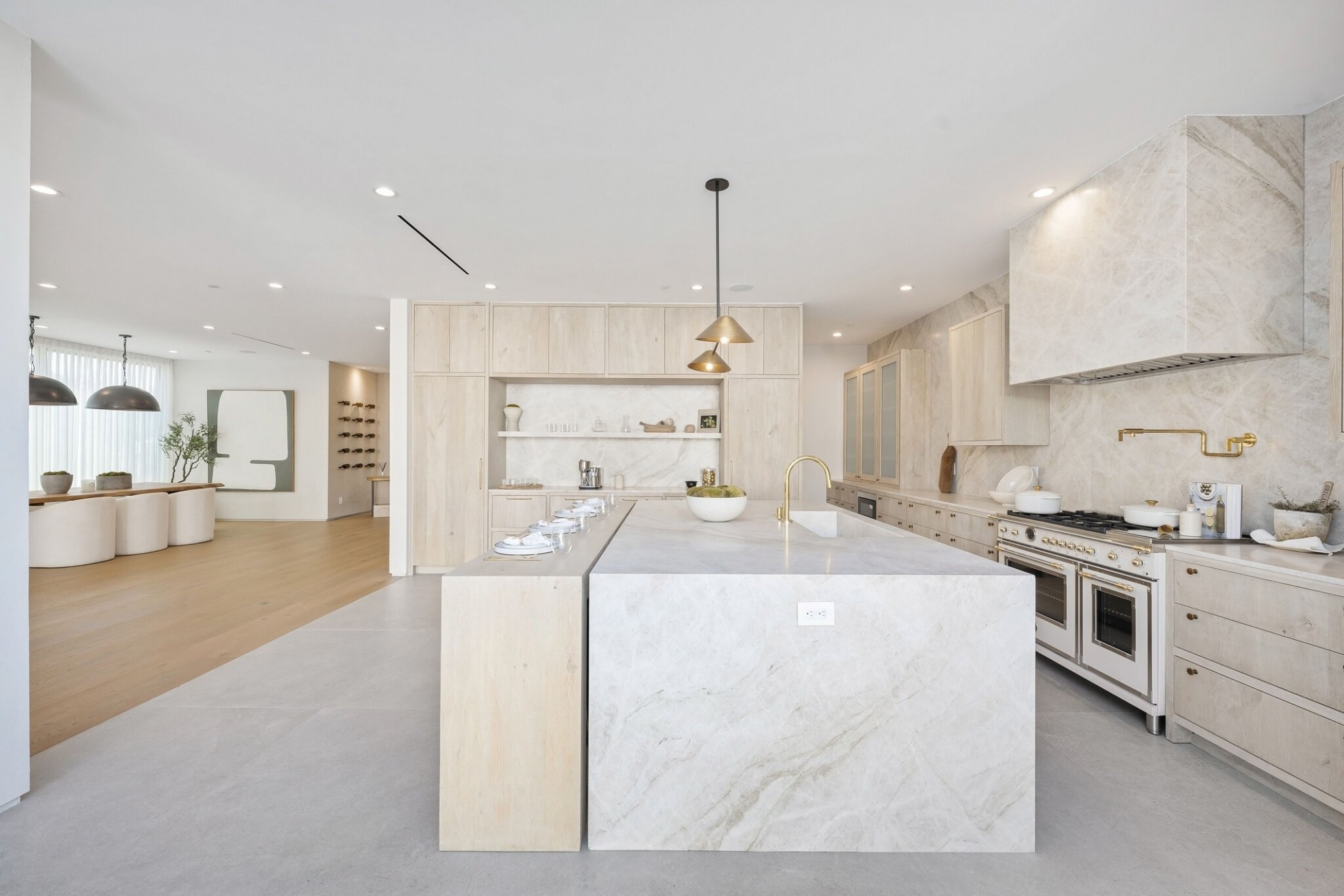 Contemporary Luxury Kitchen With Warm Wood And Light Stone Finishes Kitchen Remodel by Pro Work Construction project photo